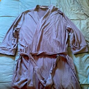 Never worn, navy blue lightweight robe with pockets.